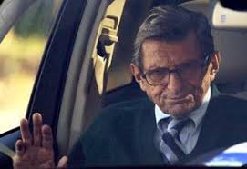 Penn State football coach Joe Paterno arrives home Wednesday after