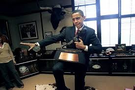 assume the Heisman pose: