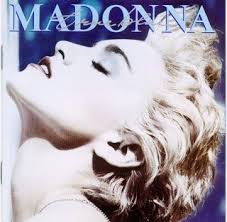 http://t2.gstatic.com/images?q=tbn:8mW-GbejX6qldM:http://circulador.files.wordpress.com/2008/08/madonna-true-blue-1986.jpg
