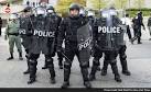 Baltimore Enlists Guard and Curfew to Halt Riots and Looting