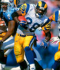 http://www.stlramsfootball.com/wp-content/uploads/2011/07/marshall-faulk-1999.jpg