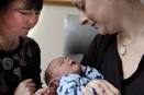 ... Mary Maternity Centre this week while his mother, Jane Strong, looks on. - week_old_luke_payne_of_dunedin_has_his_hearing_scr_4c6503ae42