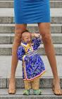 Book of Guinnes World Record: HE PINGPING - worlds shortest man (