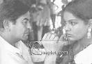 Raj Kapoor applying make-up on