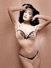 http://www.skinnyvscurvy.com/wp-content/uploads/2009/10/dita-von-teese-as-a-wonderbra-model-21.jpg