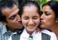 Sania Mirza gets a kiss from her parents, Imran and Naseem Mirza, ... - sp2