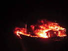 Pakistani fishermen blow up own boat after India navy chase.