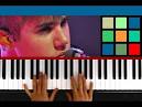 Justin Bieber playing keyboards