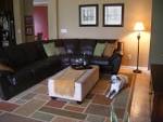 Decorating with leather sofa (mirror, hardwood floors, fireplace ...