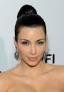 http://www.glamour.com/beauty/blogs/girls-in-the-beauty-department/2011/01/31/0611-kim_kardashian_high_bun_bd.jpg