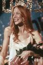 http://maniacsofhorror.files.wordpress.com/2011/05/carrie-prom-queen.jpg