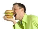 Weight Loss Tips - man eats
