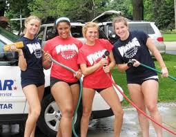 Susan KetchumMary Cvelbar, left, Shayla Lang, Kim Rossman and Kelly Trueman are ready to wash cars at Villa Angela Saint Joseph High School. - large_IMG_2633s