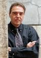 ... Harry Burton, an Australian cameraman for Reuters; Julio Fuentes, ... - julio_fuentes_afghanistan_2001