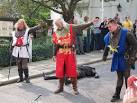 The end of a sword and axe fighting reenactment during Mediaeval day. - via Daymix