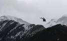 Investigators search mountains after inexplicable Airbus crash.
