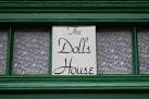 The Name which appears above the door of the house known as the dolls house - via Daymix