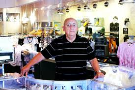 JUST JACK | Union Jack owner Richard Longstaff stands behind the counter of his Cedar Springs Road store, which celebrates its 40th anniversary in August. - Longstaff-option-2