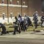 Ferguson protests: Time and rain cool tempers; hunt on for.