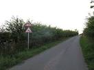 warning of slippery road conditions and soft verges. - via Daymix