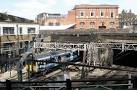 Train diving under the Norton Folgate Railway Bridge. - via Daymix