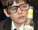 Anthony Bull, 12, wears glasses designed to mimic the effects of drunkenness - -13108