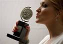 100614-tony-awards.jpg AP photoKatie Finneran kisses her Tony Award for Best