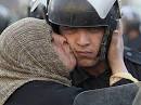 kisses a riot police