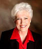 Dr. DicQie Fuller-Looney holds