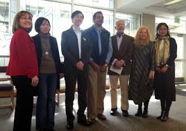 Dr. Baohua Wang and Dr. Baboo Surnam, center, join members of the community at Culture and Academia: A Fulbright Perspective on Monday, Mar. 12. - cam-drs-baohua-wang-baboo-surnam-fulbright-scholars-jhirschi