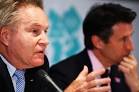 IOC's Denis Oswald (L) says