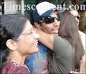 Indian cricketer Robin Uthappa hugs family members on his arrival at ... - Robin-Uthappa