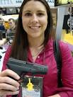 Kristin Hunt with Taurus' PT709 compact 9mm pistol. - DSC02348