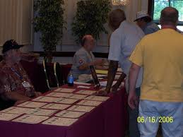 Bill Presley and Metz work the Registration Desk photo courtesy of Barney Tharp - bill_presley_and_metz