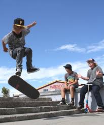 Kick flip: Josh Findlay attempts a trick at the Blenheim skatepark yesterday, watched by Jaden Shaw and Alex Timpson. The skaties say the park is long ... - 6429348