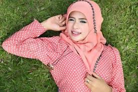 Beautiful muslim girl pink hijab wearing fashion in the nature ...