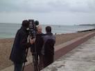 the record-breaking pilot's son being interviewed for television against - via Daymix
