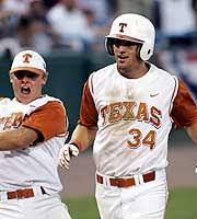 Texas\u0026#39; Cody Buck, left, celebrates as Chance Wheeless nears home plate after he hit the game-winning home run against Baylor. - 2005-06-23-in-wheeless