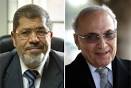 Egyptians will choose between Muslim Brotherhood's candidate Mohammed Mursi ... - Egyptians-will-choose-between-Muslim-Brotherhood’s-candidate-Mohammed-Mursi-and-Ahmed-Shafiq-a-candidate-from-the-Mubarak-era-regime-when-the-presidential-election-goes-to-a-run-off