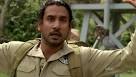 Sayid is shot by Roger while carrying a nuclear bomb. - 5x16_Sayid_shot_with_the_bomb