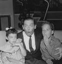 http://upload.wikimedia.org/wikipedia/commons/0/0b/Milton_berle_angela_cartright_rusty_hamer.JPG
