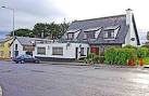 A local pub with TV and darts. - via Daymix