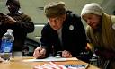 Iowa caucuses A voter registers at a caucues at a school in Des Moines,