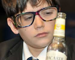 By Staff Reporter on Wednesday, 16 February 2011. Anthony Bull, 12, wears glasses designed to mimic the effects of drunkenness - -13108