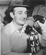 Tom Harmon at WJR mike in