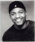 Imitates Paul Mooney,