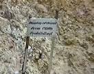 Sign at Alum Bay prohibiting the digging of sand from the cliffs. - via Daymix