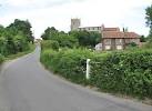 Approaching Wiveton from the east. The view was taken from Wiveton Bridge - via Daymix