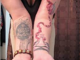 tattoos Robert Pattinson