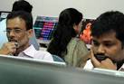 Stock brokers react as thay watch share prices at a brokerage house in ... - ALBERT_SENSEX_DOWN__9791f